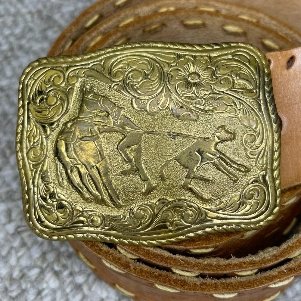 Cowboy belt buckle and leather belt